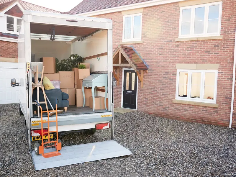 familys belongings in a removals van ready to move into their new home