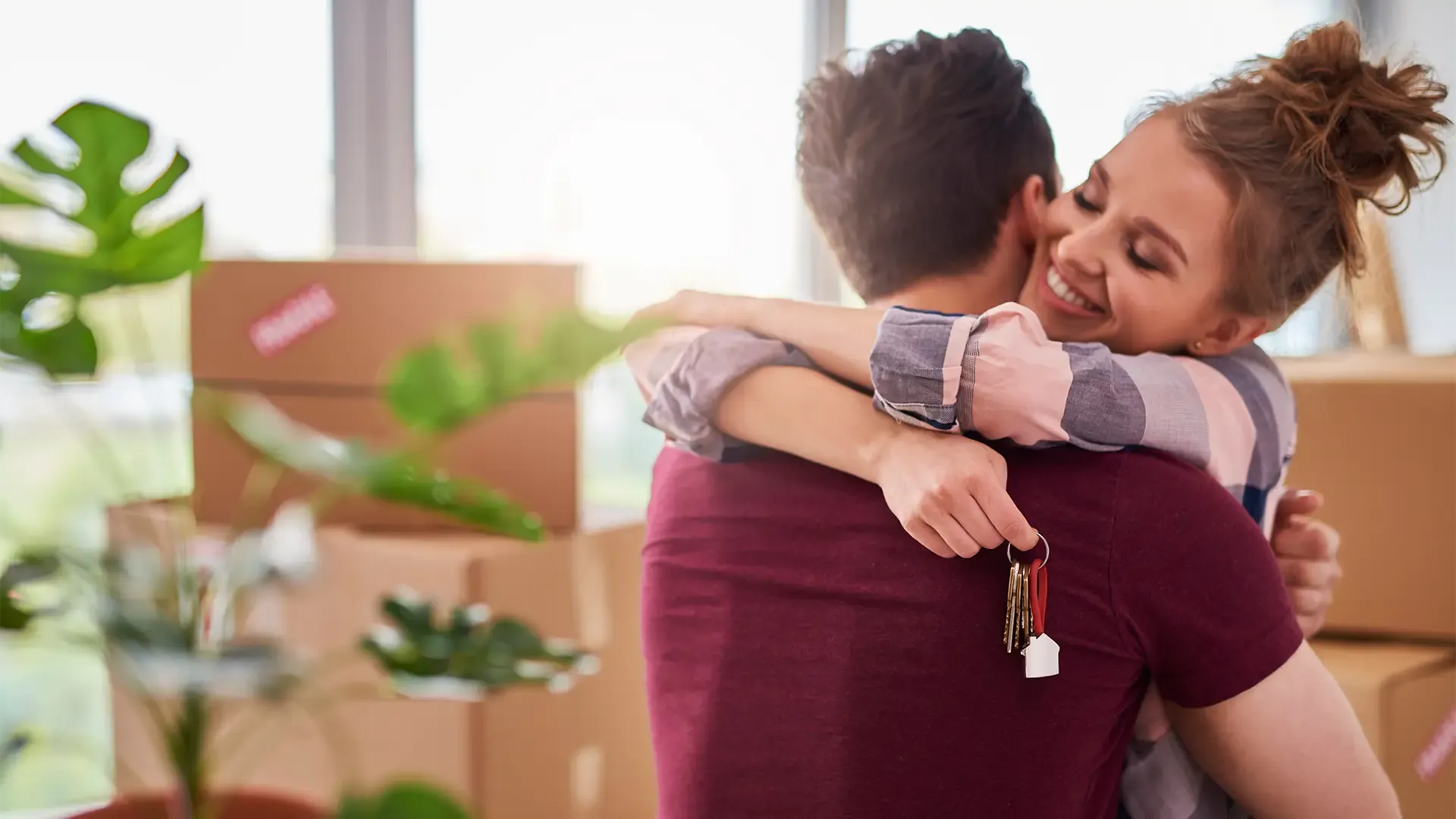 first time buyers with the keys to their first home