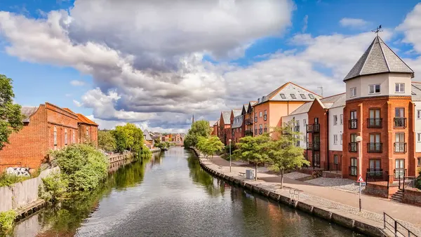 houses and flats along the River Wensum in Norwich, Norfolk, England
