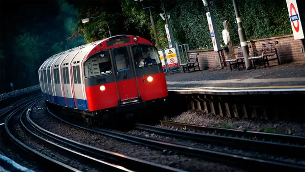 train heading to Uxbridge passing through Park Royal Station, London, UK