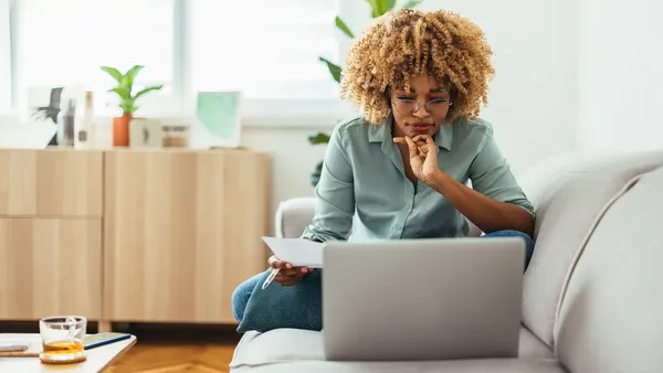 woman looking into what is probate and how the probate process works so she can sell her late mothers home