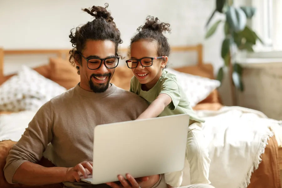 man looking at his conveyancing fees online