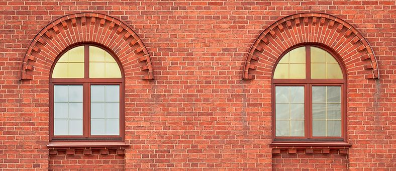 Windows with brick archways