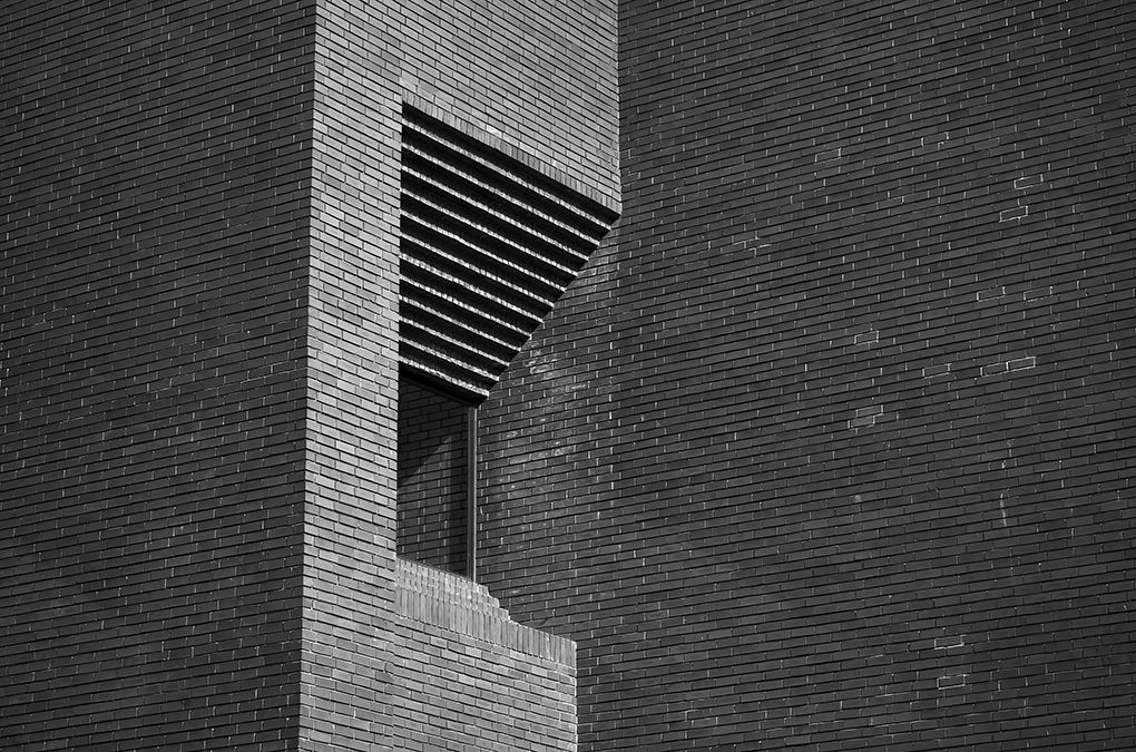 A dramatic shot of modern brick architecture