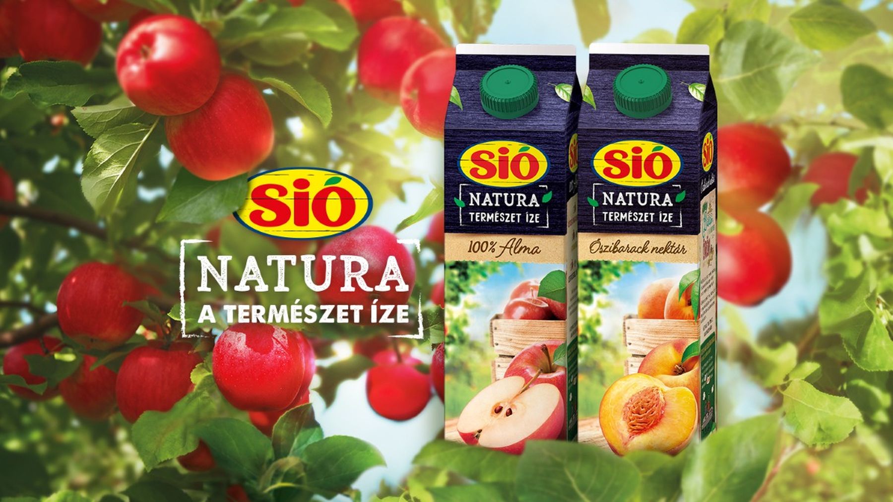 Two Sió Natura juice cartons with apple and peach flavors, surrounded by lush apple trees and ripe red apples.