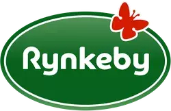 Rynkeby logo featuring a green oval with the word 'Rynkeby' written in white, bold letters in the center. There is a red butterfly positioned at the top right corner of the oval.