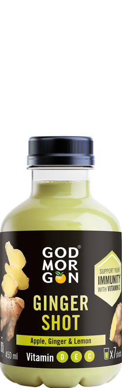A 450ml God Morgon ginger shot bottle with apple, ginger, and lemon flavor, featuring vitamin D, E, C, and an immunity support label.