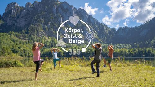 Four people doing outdoor sports by a mountain lake. The picture reads ‘Body, Mind & Mountains 365’.