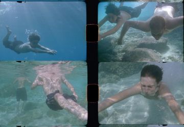 Four photos of people snorkeling underwater, exploring rocks and coral in clear blue water, with light filtering from above.