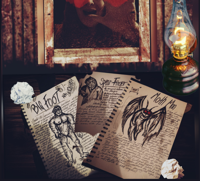 A desk with three illustrated notebooks featuring "Bigfoot," "Spear Finger," and "Moth Man," next to a glowing oil lamp and crumpled paper.