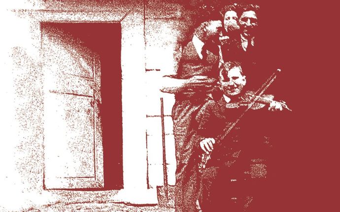 Monochrome photo showing an open door while people stand outside, one is smiling playing violin with three adults behind him smiling