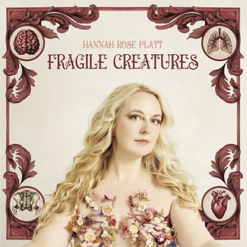 Album cover with a woman in floral attire, surrounded by anatomical illustrations. The text reads "Hannah Rose Platt - Fragile Creatures."