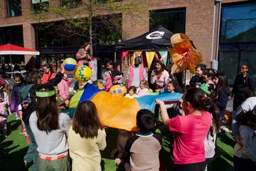 A group of children playing with objects