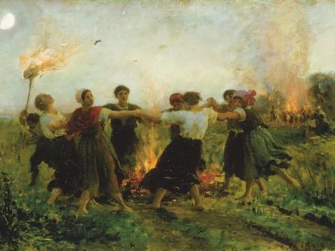 Old painting of children dancing around a fire pit in field