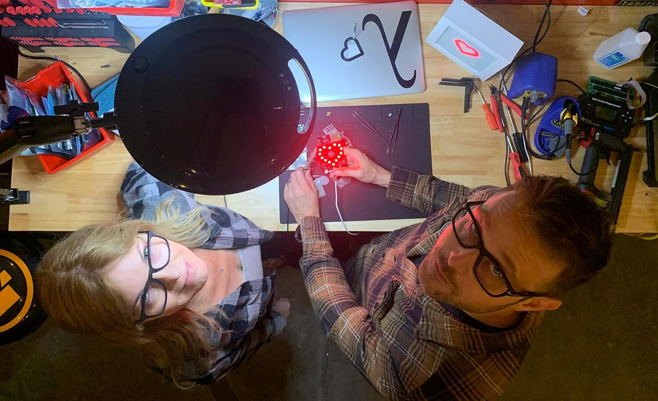 John and Amy assembling LoveLights
