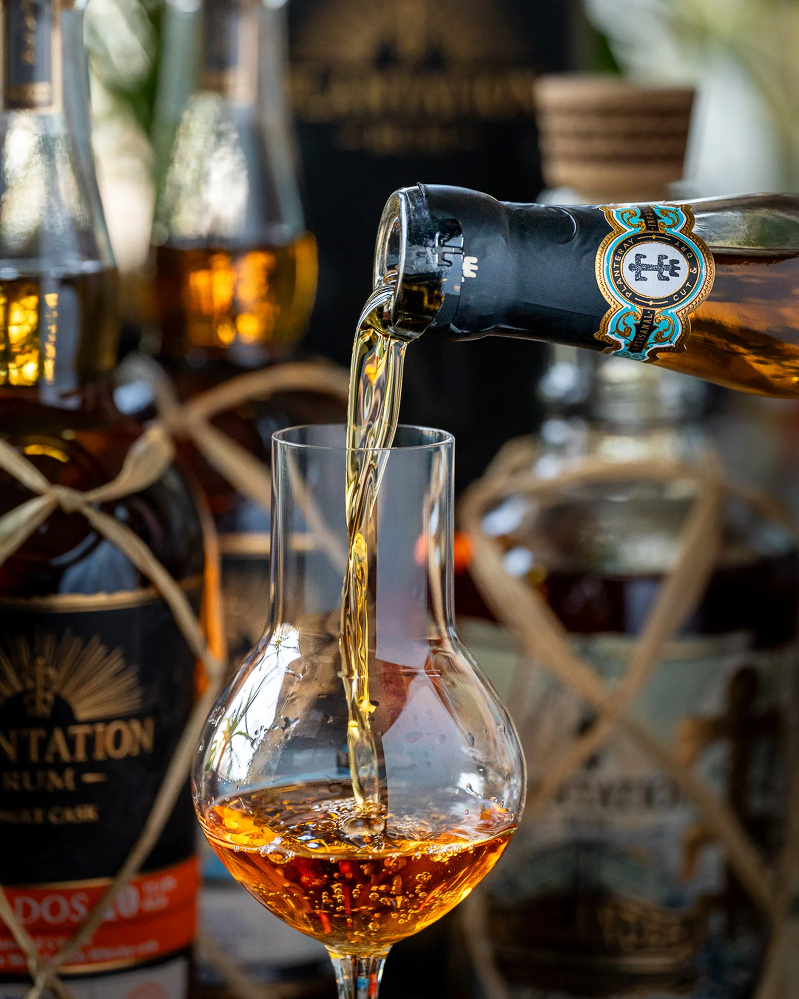 The new Planteray rum is poured into a tasting glass The new Planteray rum is poured into a tasting glass