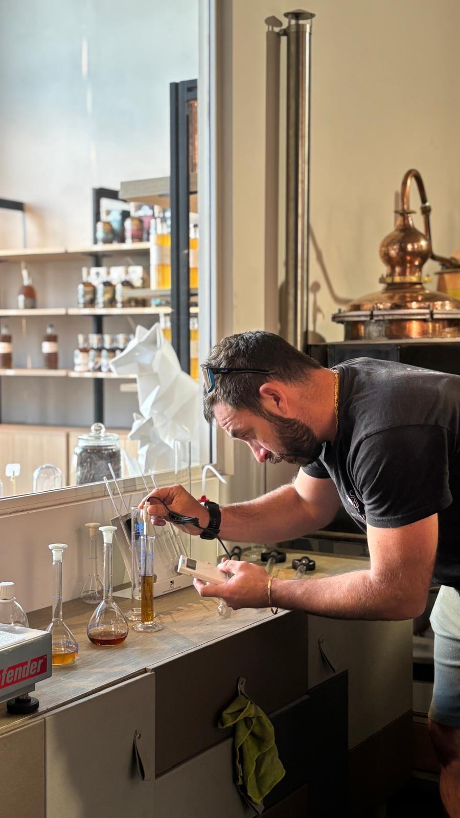 Morgan Ricci blends our RumX Navy Rum with intense concentration.
