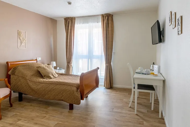 Chambre résidence Tiers Temps à Rouen lumineuse beige et blanc spacieuse