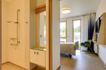 Maison retraite Jardins l'Aunette Chamant suite chambre vue cours intérieur paysage nature douche italienne