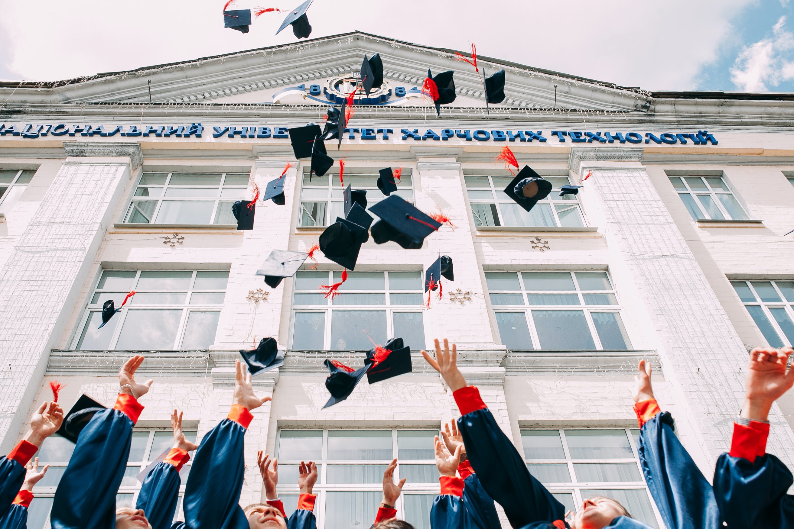 University graduation picture - hats thrown up