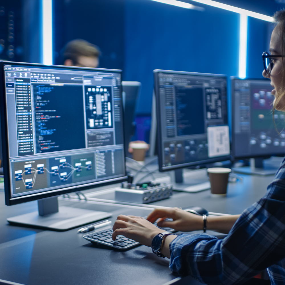 Woman working at computer with generative AI in industrial companies