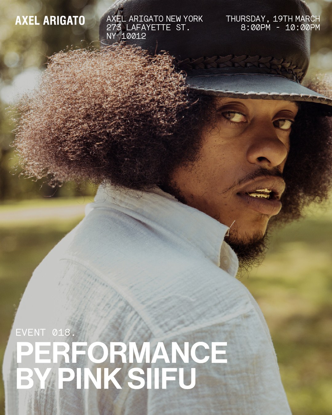 Person with an afro and hat looking back, in an outdoor setting. Text details an event: "Performance by Pink Siifu at Axel Arigato New York."