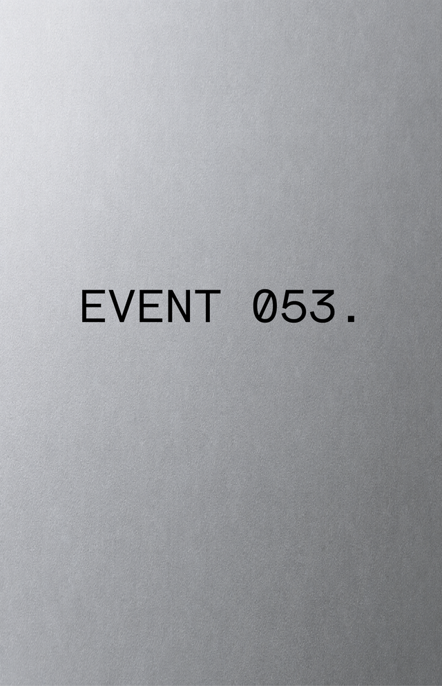 The image shows the text "EVENT 053." in black on a gray background.