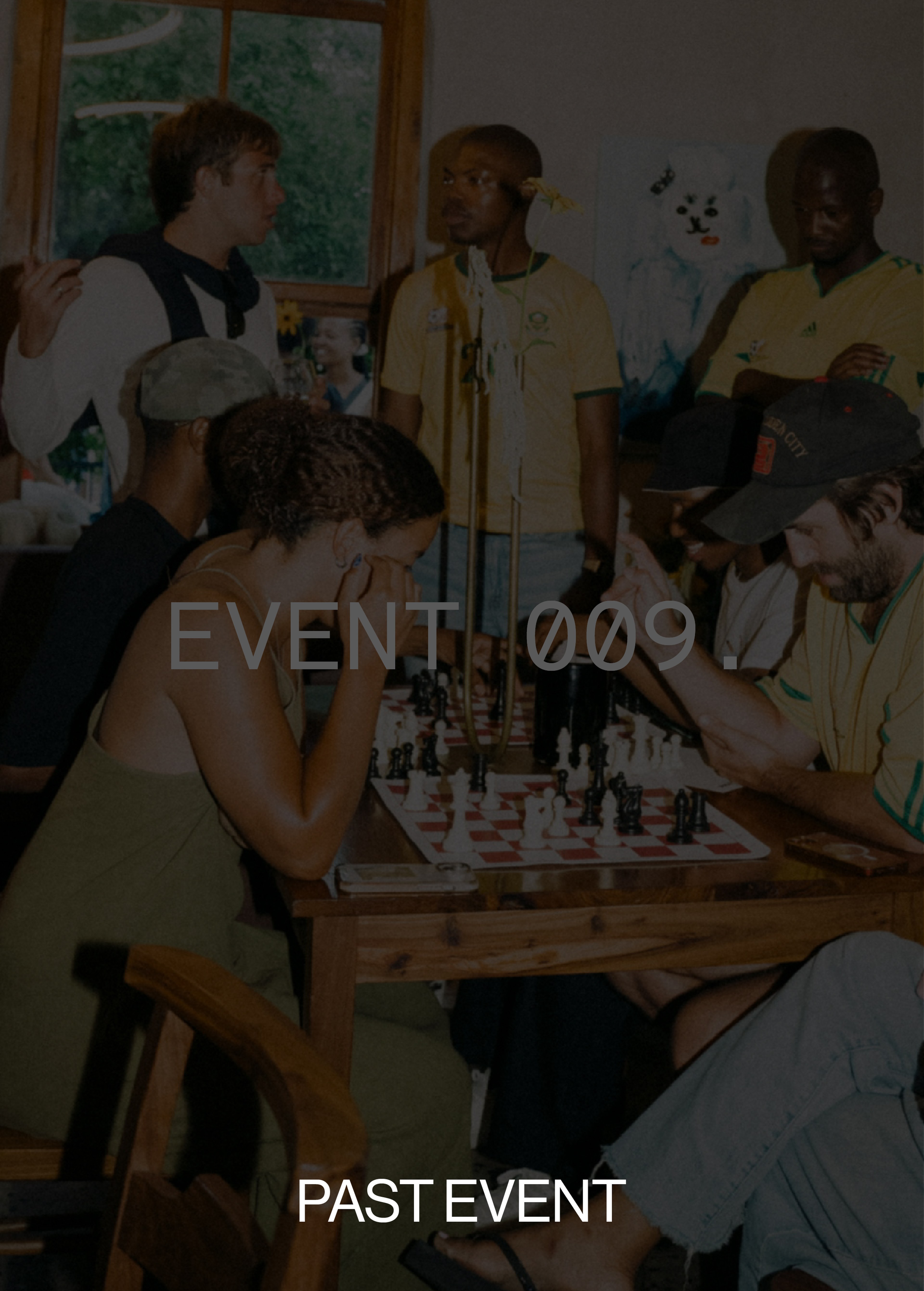 People gathered around a chess game indoors, with three individuals in sports attire standing nearby. Text reads "EVENT 009" and "PAST EVENT."
