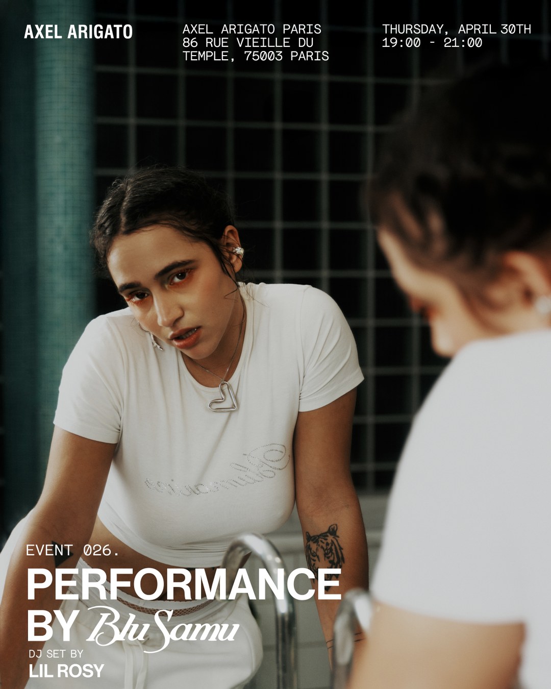 Person in white shirt leaning on sink, looking at reflection. Text details a performance event at Axel Arigato Paris on April 30th.