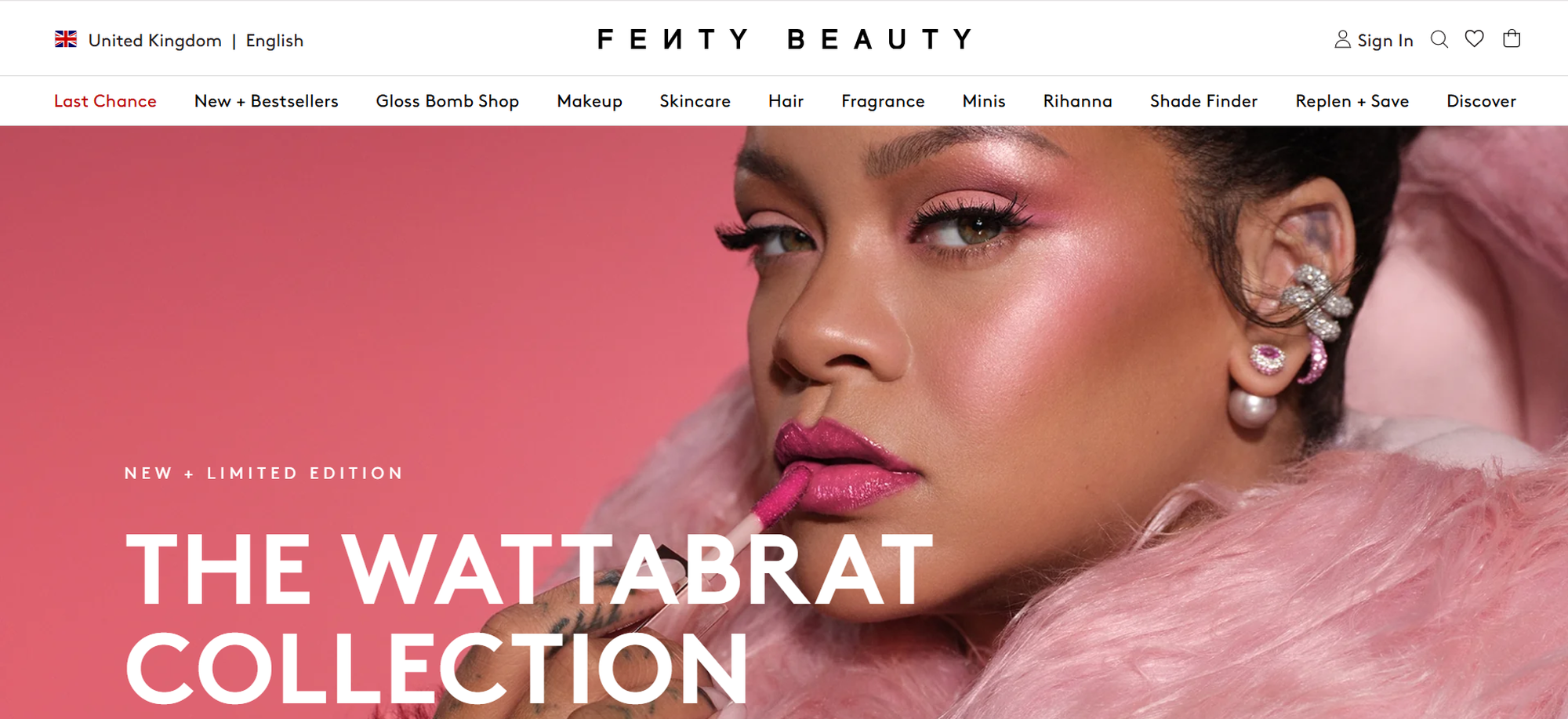 Woman with pink makeup and earrings applies lipstick, set against a pink background, with "Fenty Beauty: The Wattabrat Collection" text overlay.