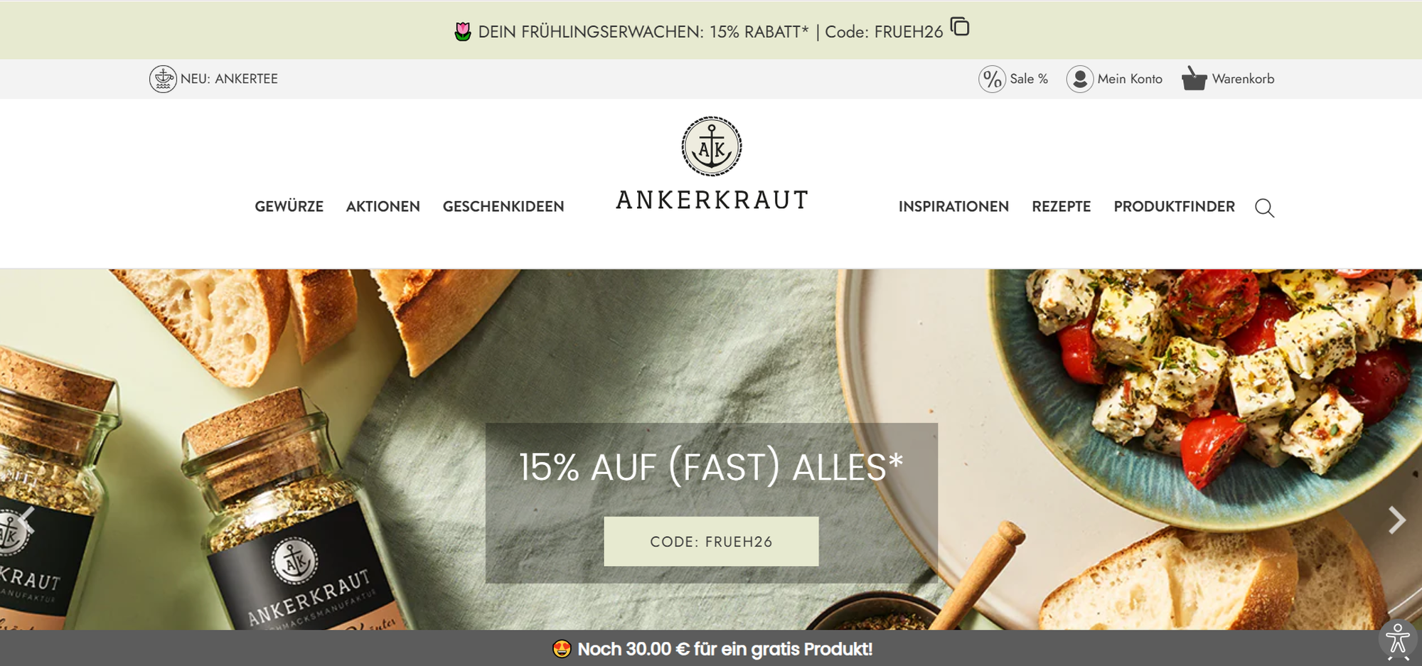 Ankerkraut website offers 15% off with code, featuring spice jars, bread, and a tomato-mozzarella dish on a table.