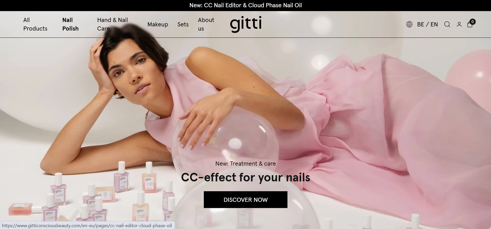 Woman in a pink dress reclining amidst nail polish bottles and pink balloons. Text: "CC-effect for your nails. Discover Now."