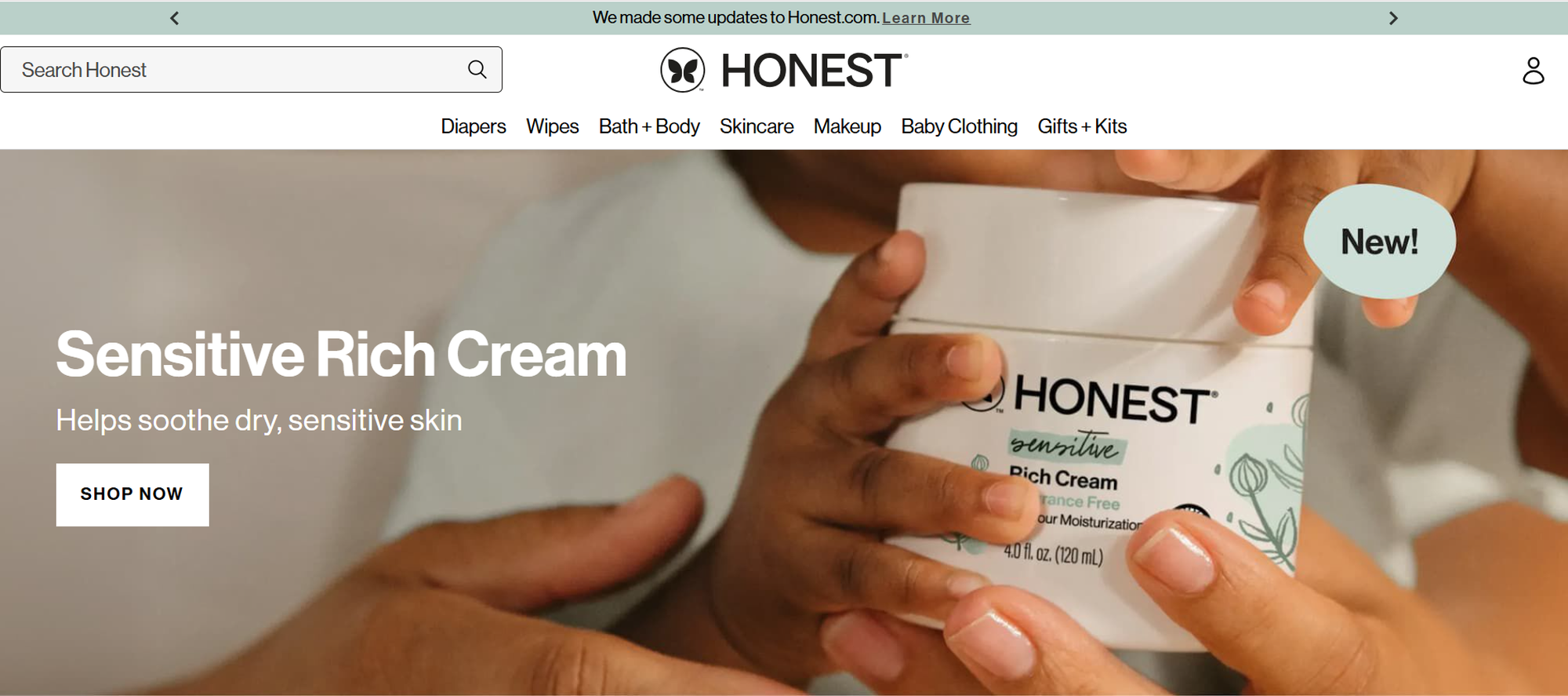 Child holding Honest Sensitive Rich Cream container; text promotes soothing for dry, sensitive skin. Website navigation and logo visible above.