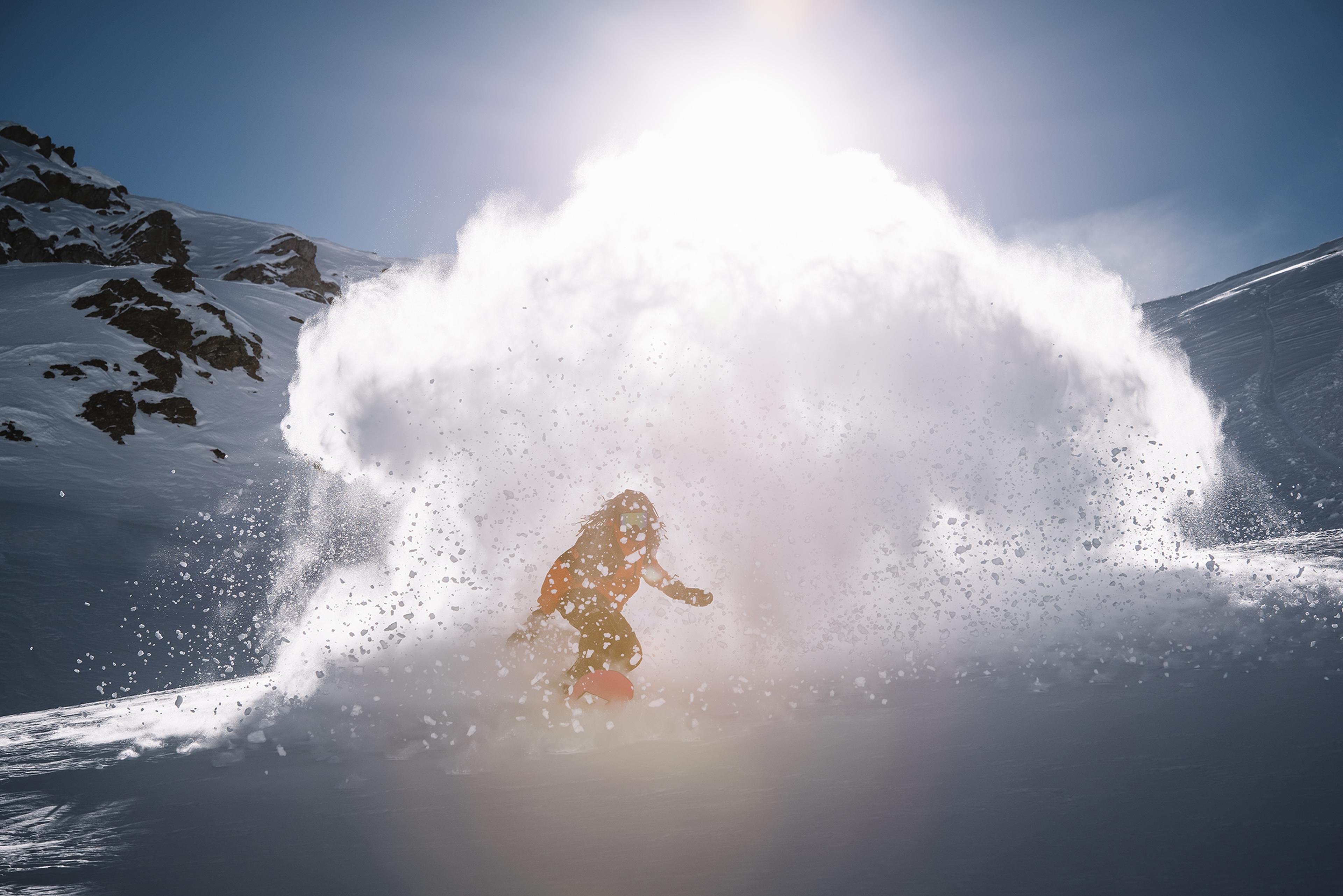 David Djite snowboarding in Laax. Photo: Dominic Zimmermann.