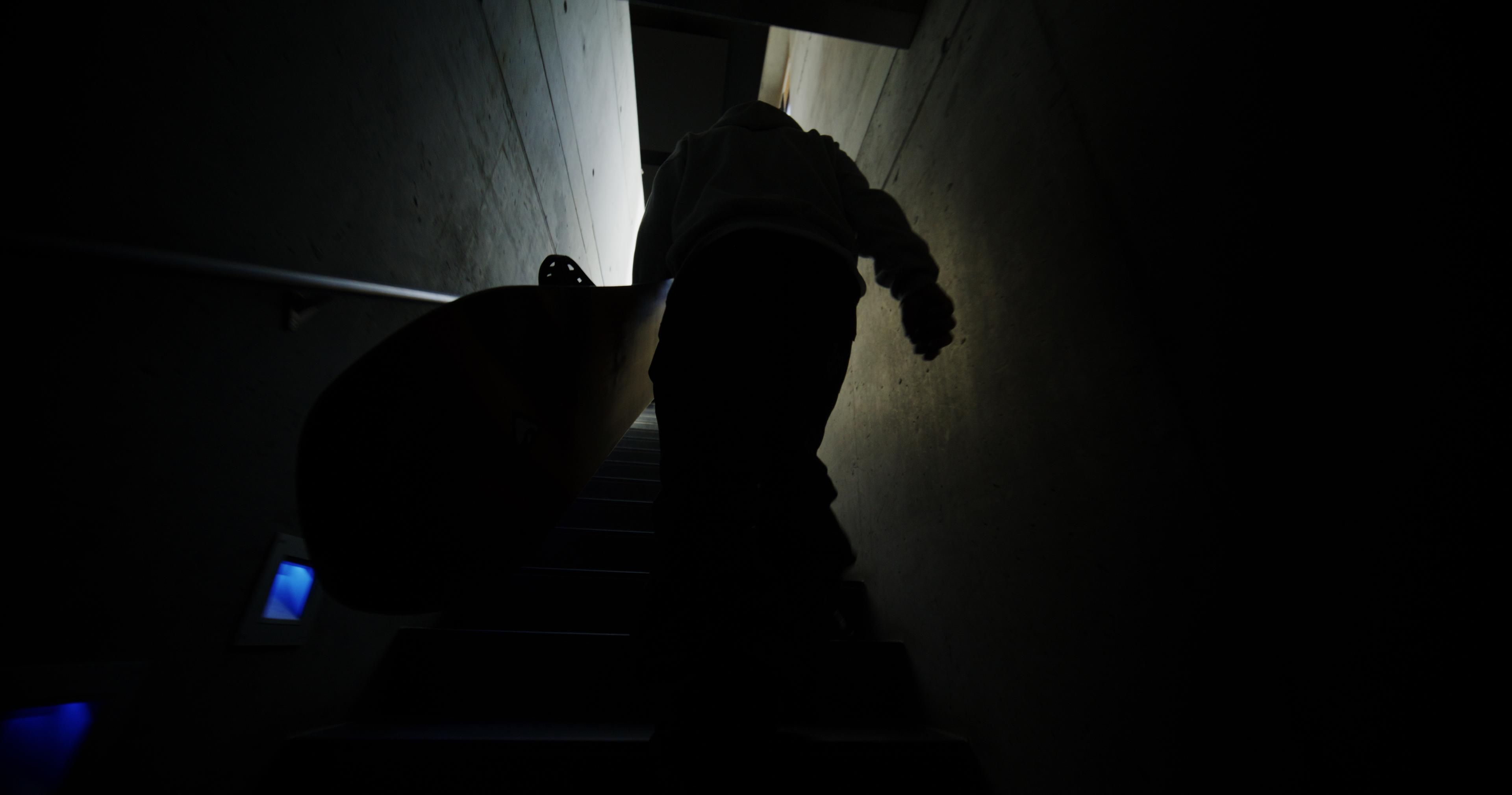 Switzerland Beyond Medals holding a snowboard