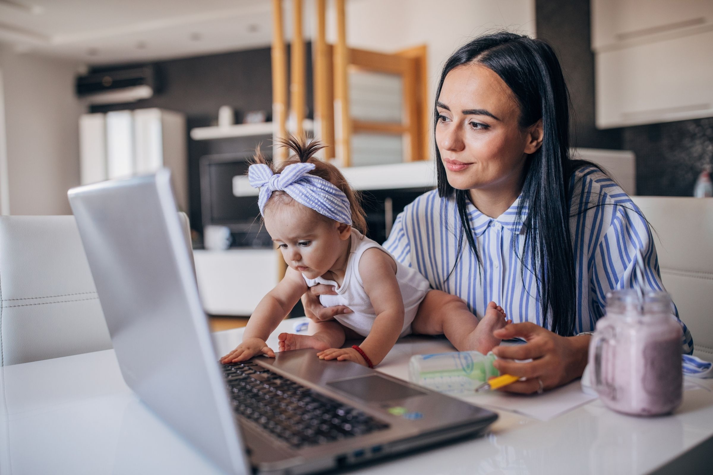 Parent verifying a babysitter’s background check with Baby Sisters, ensuring a trustworthy babysitter for safe childcare.