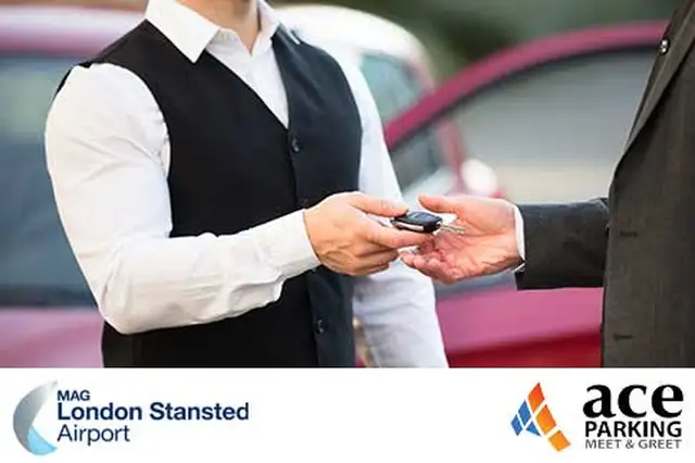 Stansted Airport ACE Parking Meet and Greet valet handing car keys to driver
