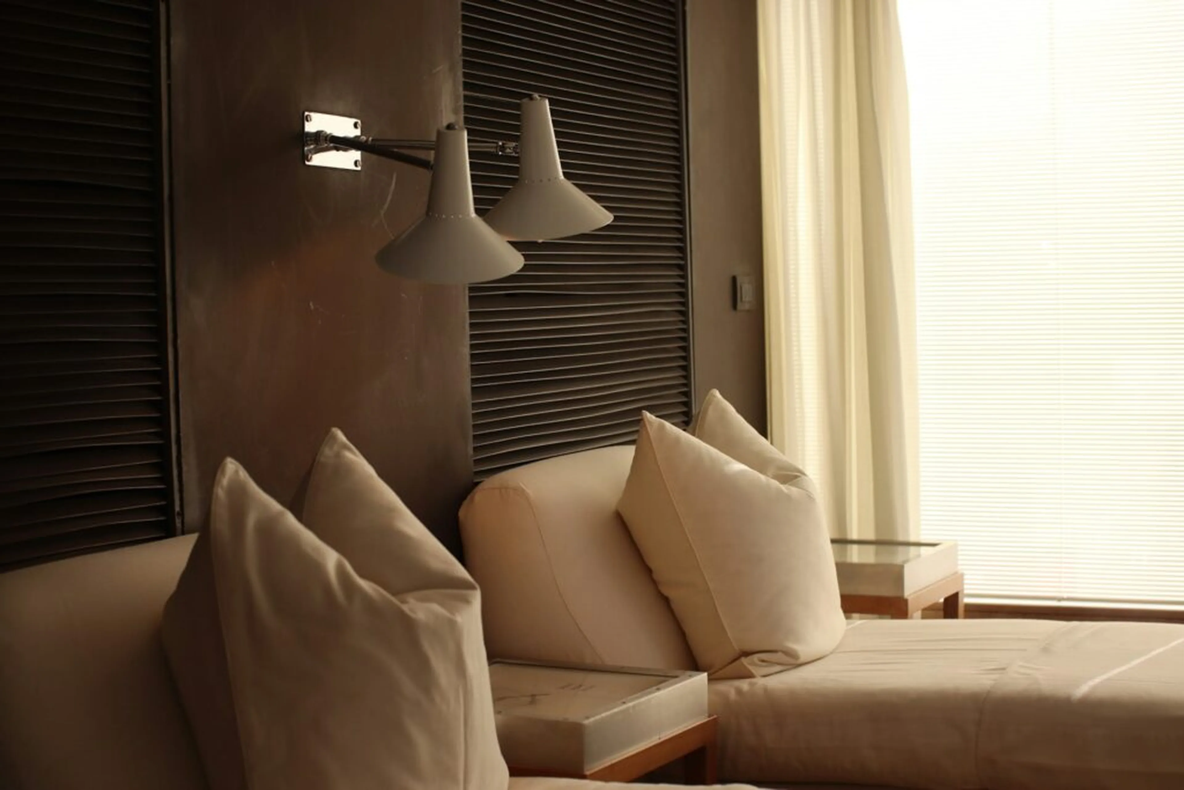 two single beds in a beige hotel room