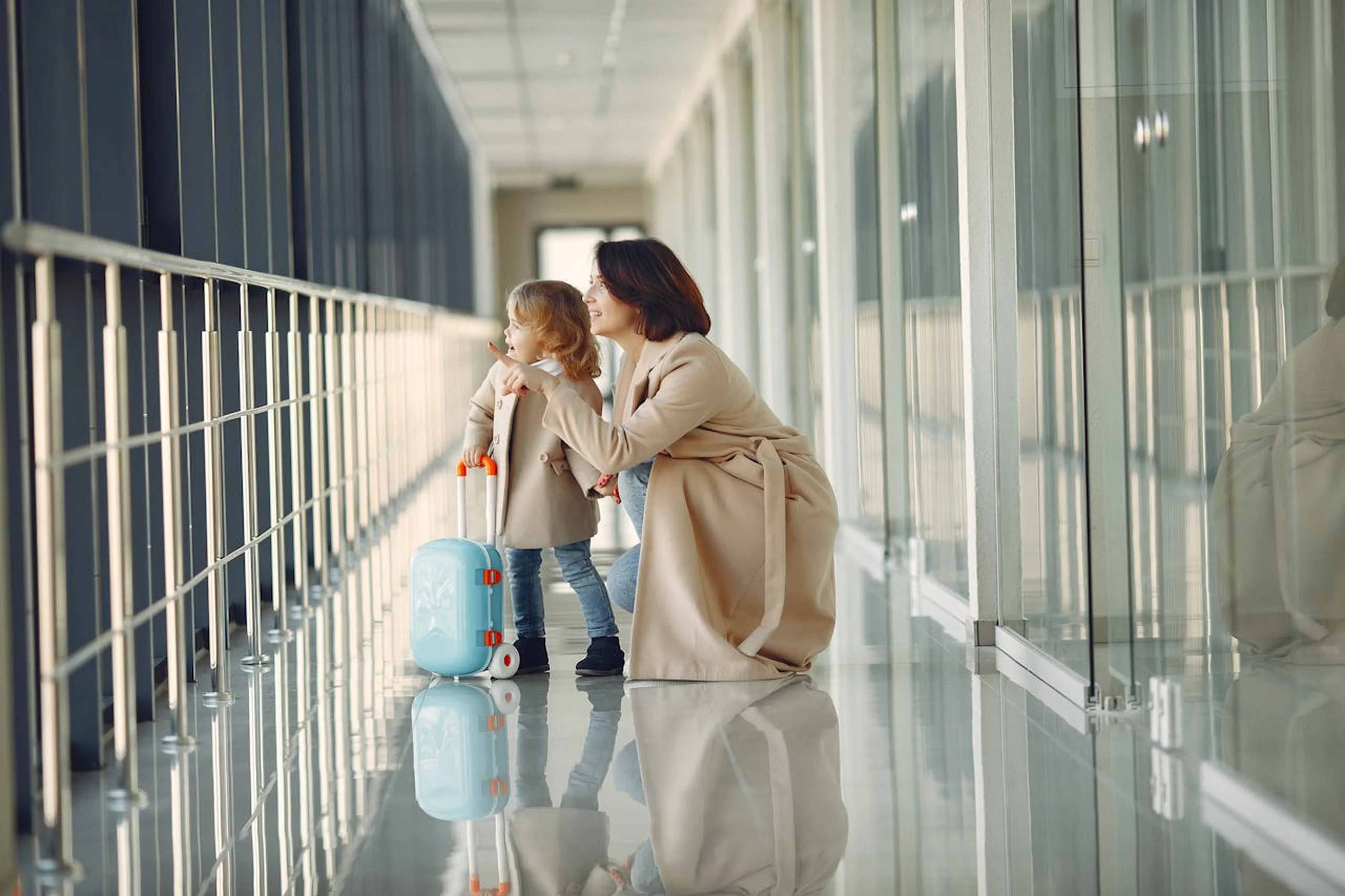 Woman and daughter at airport