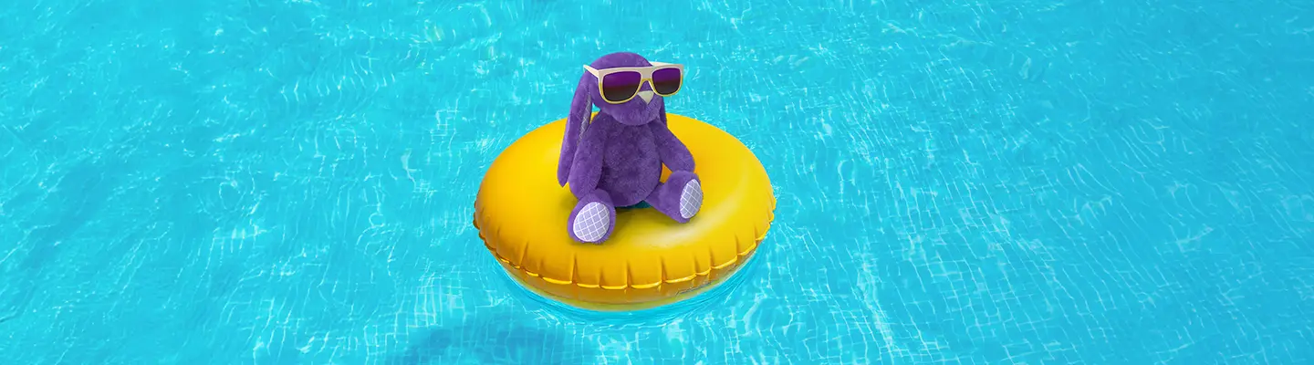 A purple plush rabbit wearing sunglasses sits on a yellow inflatable float in a bright blue swimming pool.
