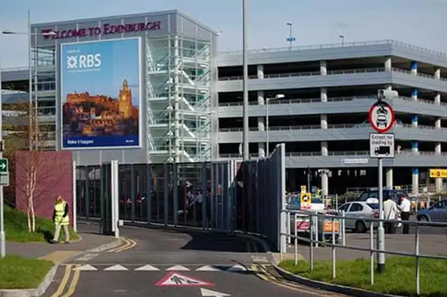Edinburgh Airport multi storey car park exterior entrance with Welcome to Edinburgh Airport sign