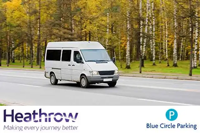 Transfer vehicle driving down a street with trees with the Heathrow logo and Blue Circle Parking logo at the bottom