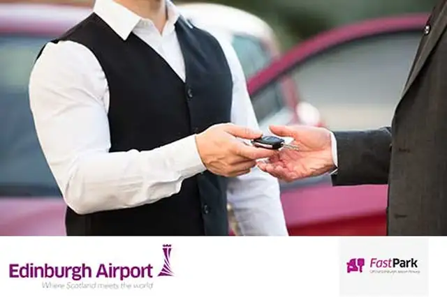 Image of passenger giving meet and greet driver car keys with edinburgh airport and Fast Park logo at the bottom