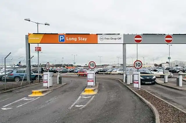 Edinburgh Airport long stay barrier entrance with overhead signage