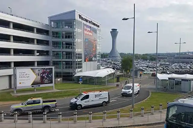 Edinburgh Airport multi storey car park with control tower in background