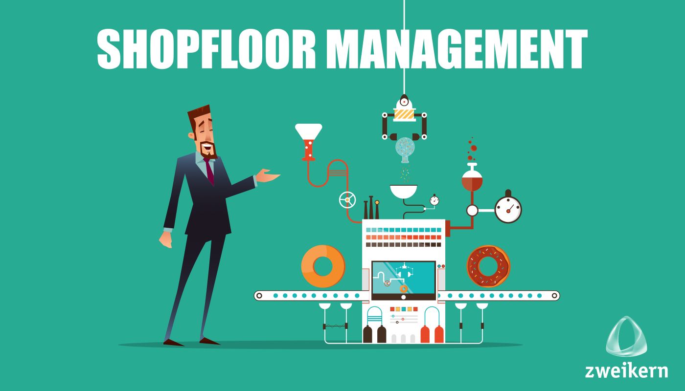 Mann steht vor Donut Maschine - zweikern