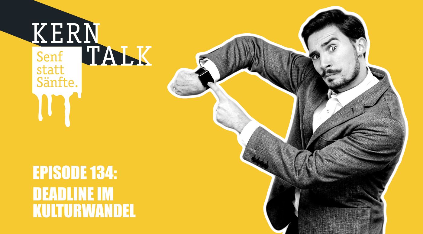 Gestresster Mann zeigt auf seine Uhr