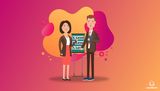 Two people standing in front of a flipchart