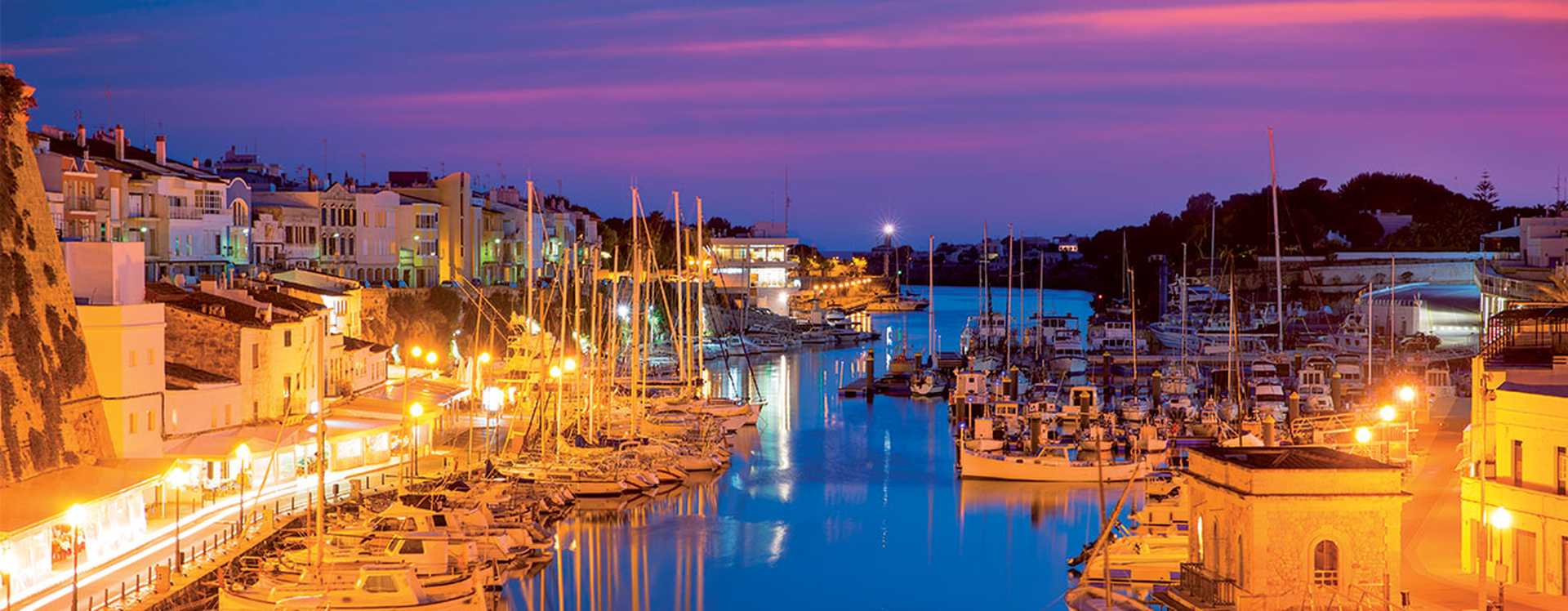 Calasfonts Cales Fonts Port sunset in Mahon at Balearic Islands