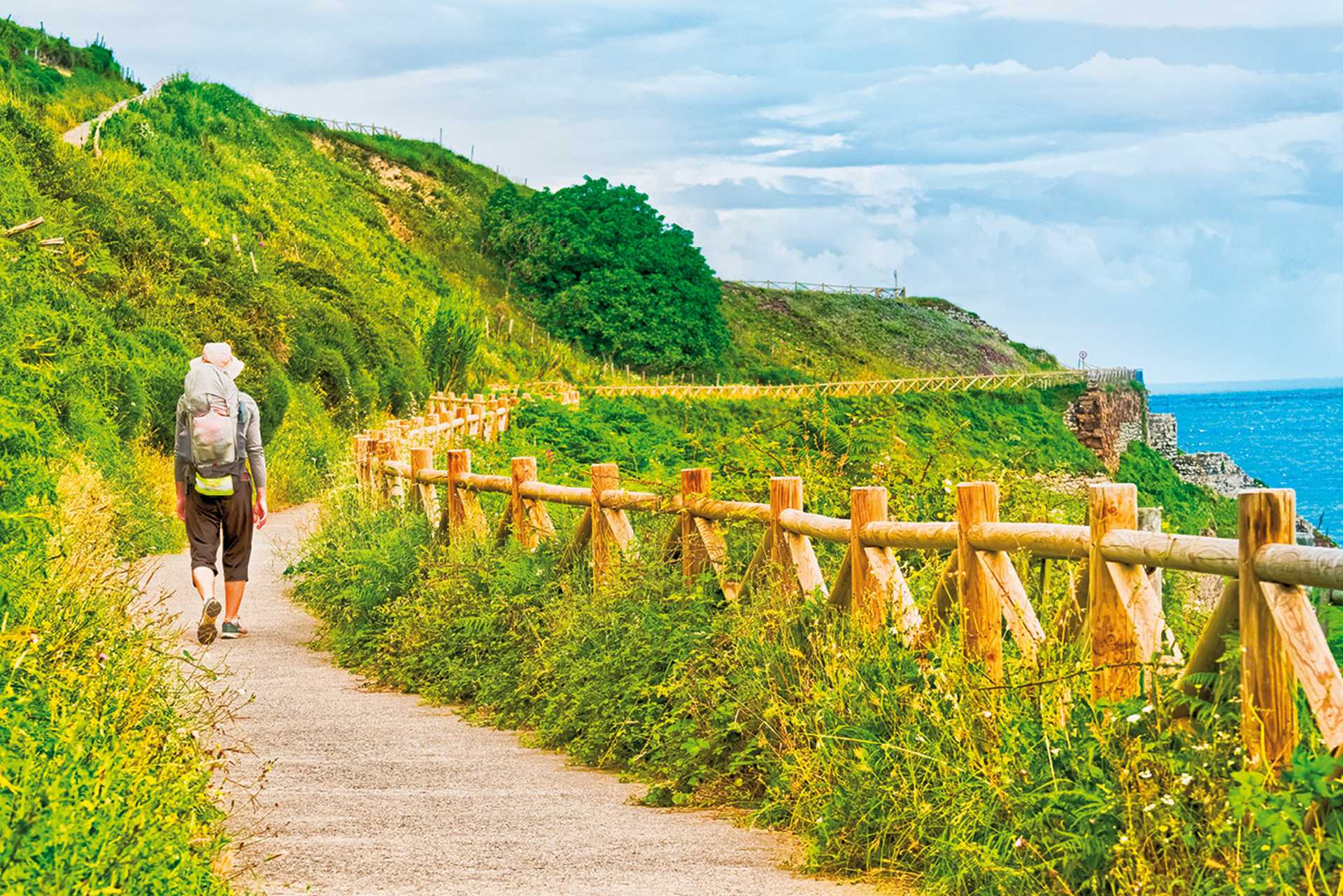 Man walking with backpack walking the Camino de Santiago in Spain, SPIN: Walking Moorish Spain